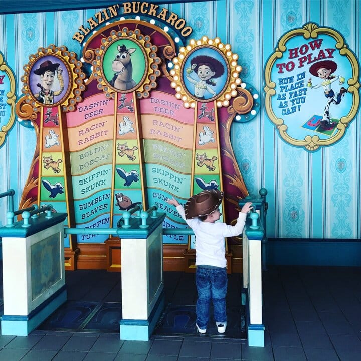 Little boy in cowboy hat playing at the kids play area at Tokyo Disneysea